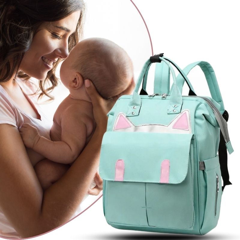 sac à langer à dos vert avec maman et bébé dans les bras