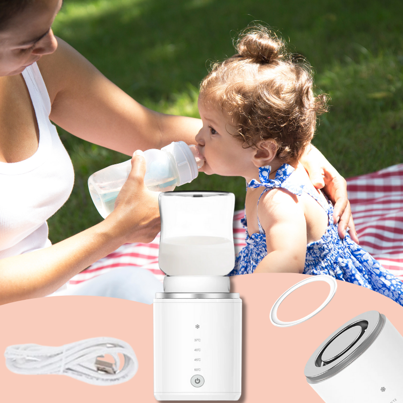 chauffe biberon nomade cable USB utilisé dans un parc