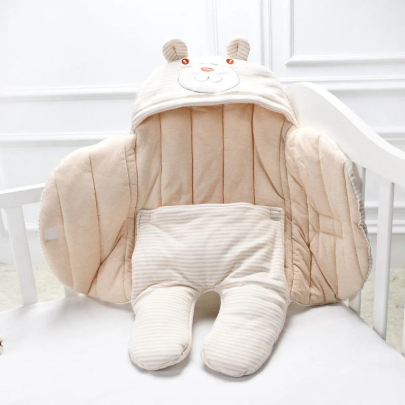 nid d'ange cosy beige jambe séparés nid d’ange cosy beige jambes séparées, position assis dans lit sans bébé