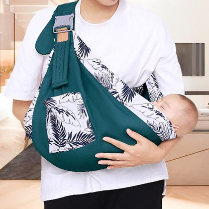 bébé dort confortablement dans echarpe porte bebe 