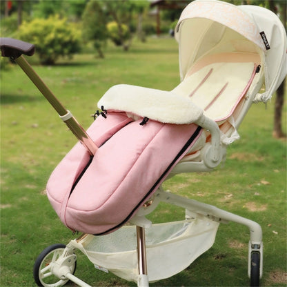 nid d’ange rose polyvalent dans poussette au parc