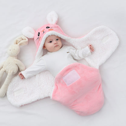 bébé enveloppe nid d'ange bebe rose tete lapin main ouverte.
