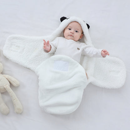 bébé enveloppé nid d'ange cosy blanc tête Panda main ouverte