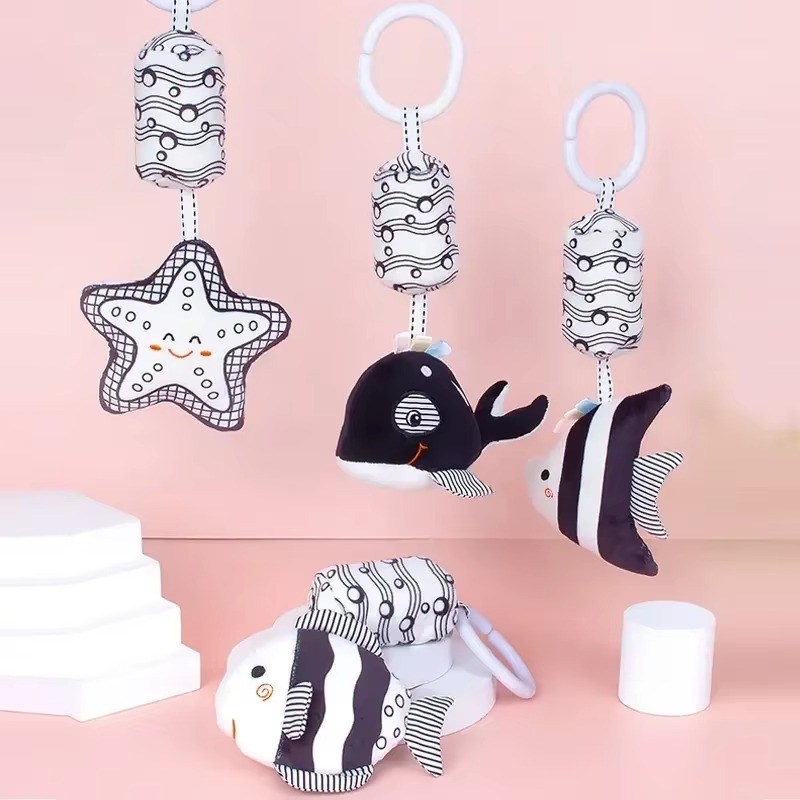 jouets poussette bebe noir et blanc