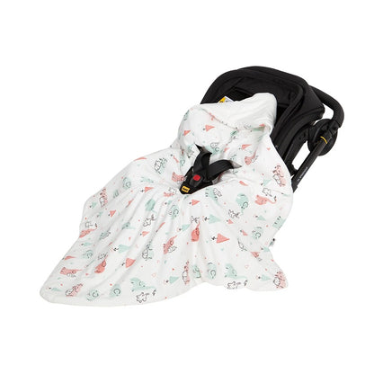 nid d'ange cosy installé dans une siège auto